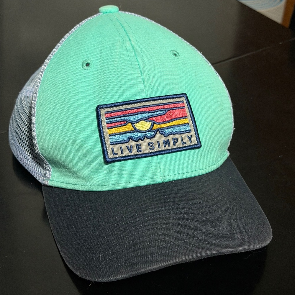 Patagonia “Live Simply” Mint Green and Black Trucker Hat.